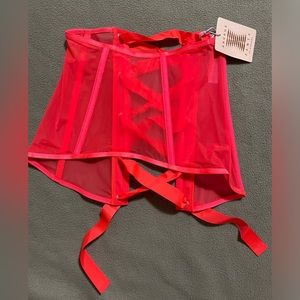 Bright pink lace up corset skirt